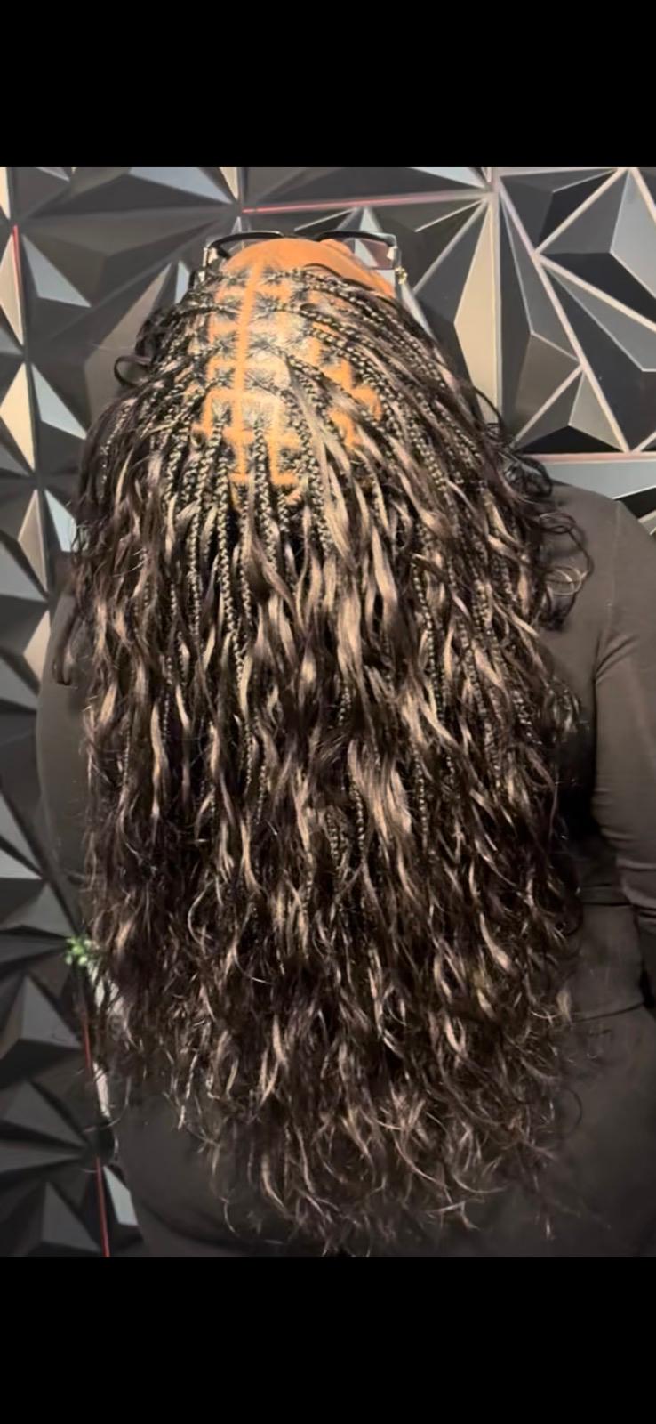 Long boho braids with curly ends by Joyce Braids