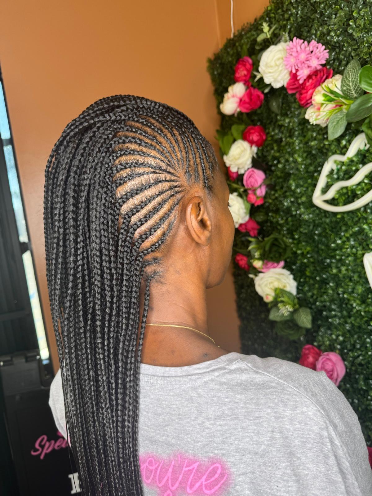 Side-swept lemonade braids by Joyce Braids