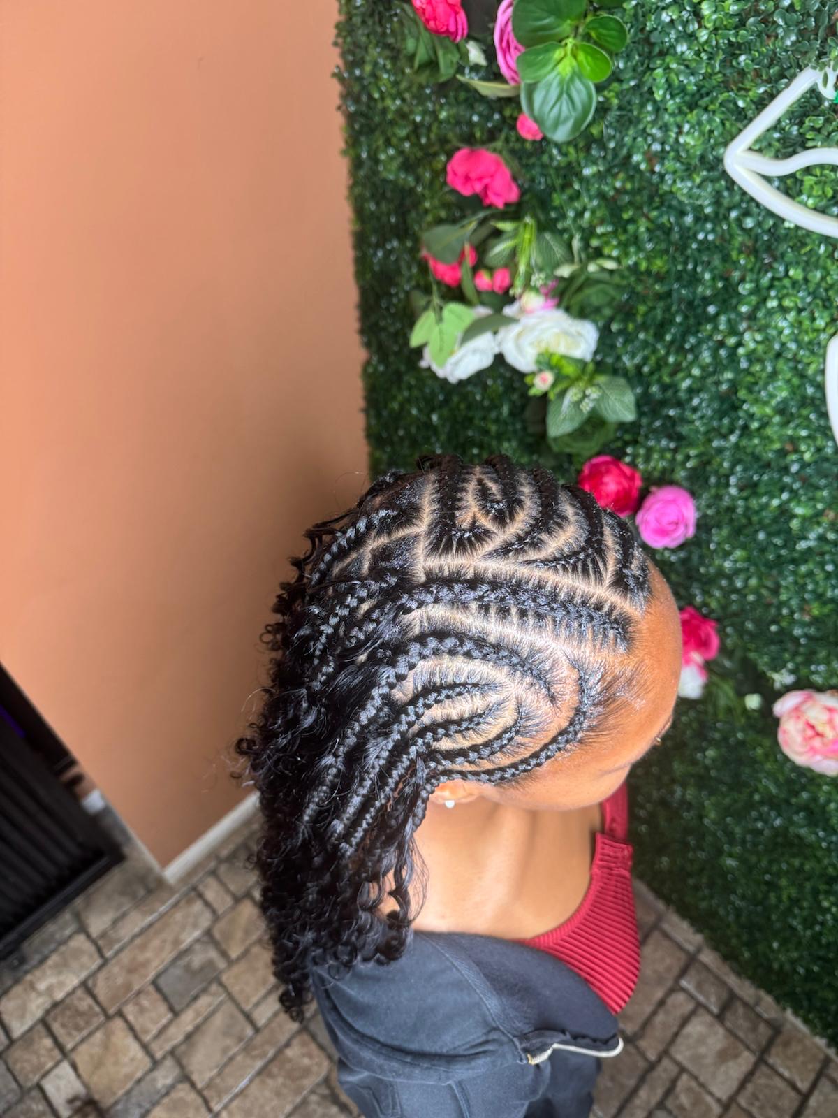 Intricate tribal braid design with curls by Joyce Braids