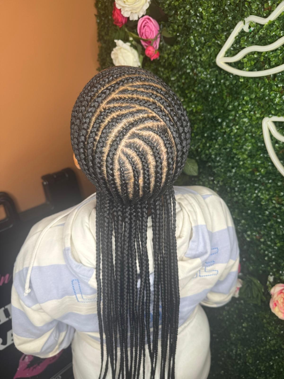 Spiral cornrow design by Joyce Braids