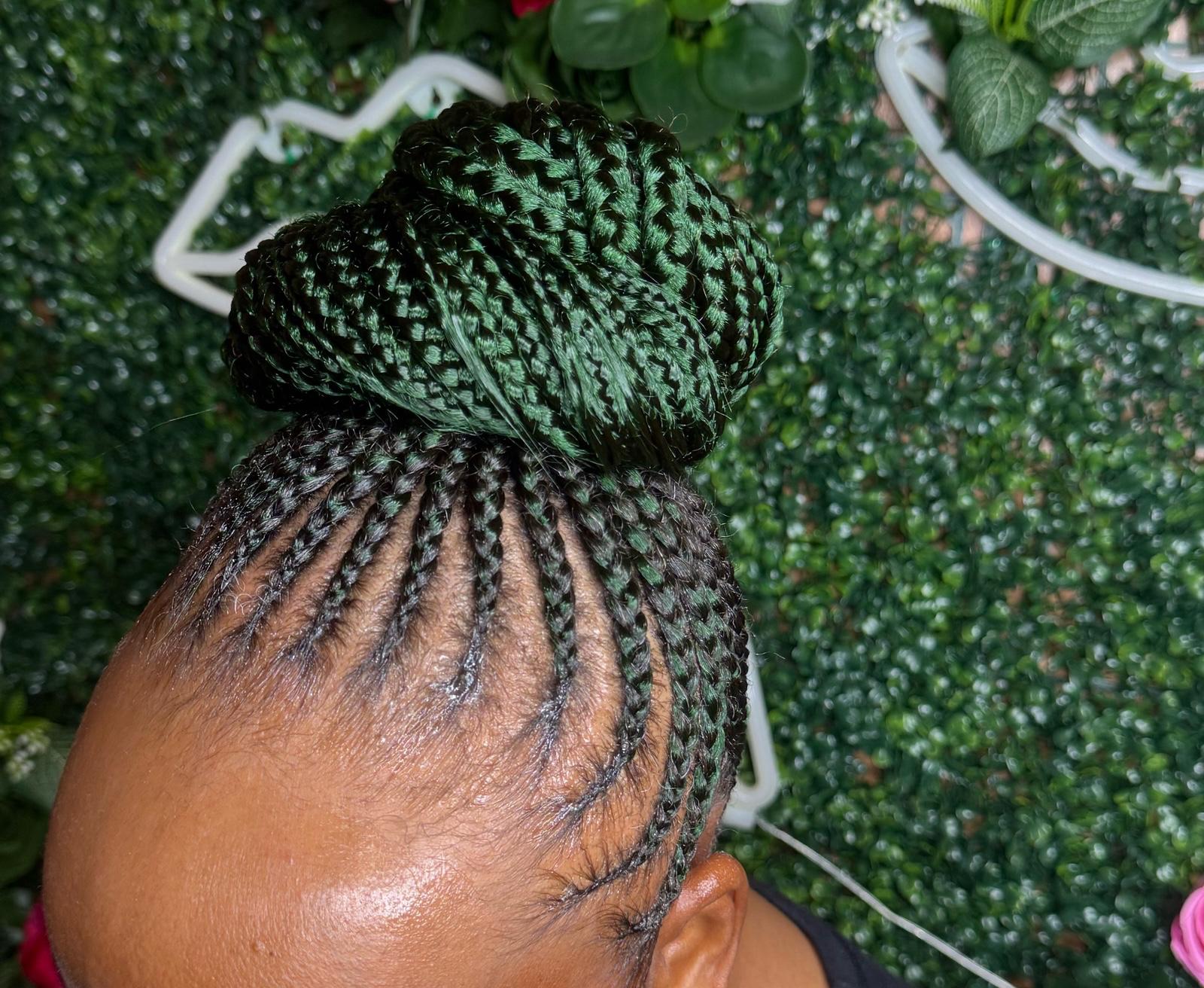 Braided updo bun second view by Joyce Braids